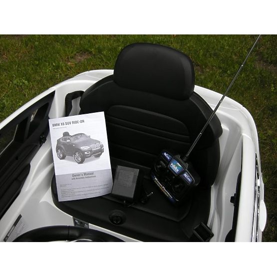 d`enfants électrique espace rover BMW X6 blancs
