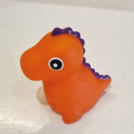 Ensemble livre et jouet changeant de couleur - Dinosaure