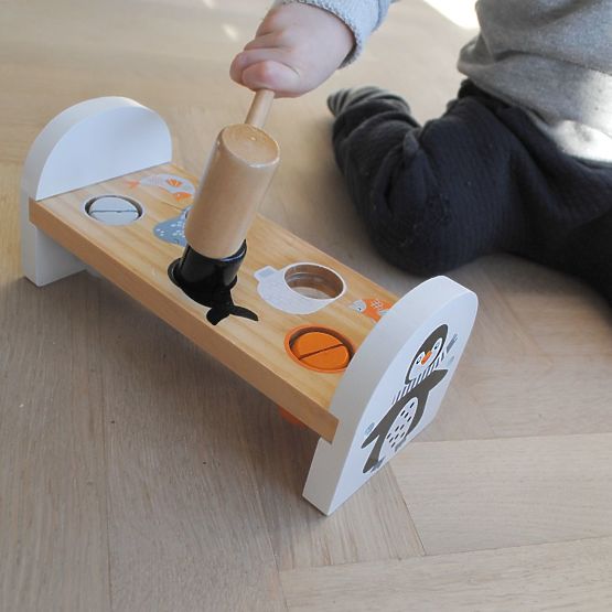Jeu de marteau avec pingouin