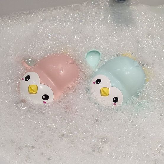 Pingouins à remonter pour le bain