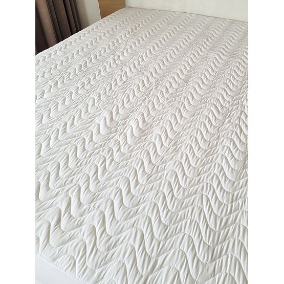 Protège-matelas avec finition imperméable