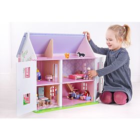 Bigjigs Toys Maison de poupées rose