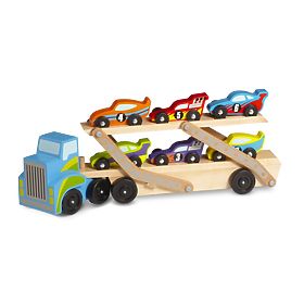 Grand camion avec voitures de course